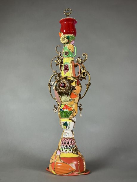 1. Little Flower - Playing Dress Up , 29 x 11 x 7” , repurposed objects, shards, paint, collage, grout, silicone